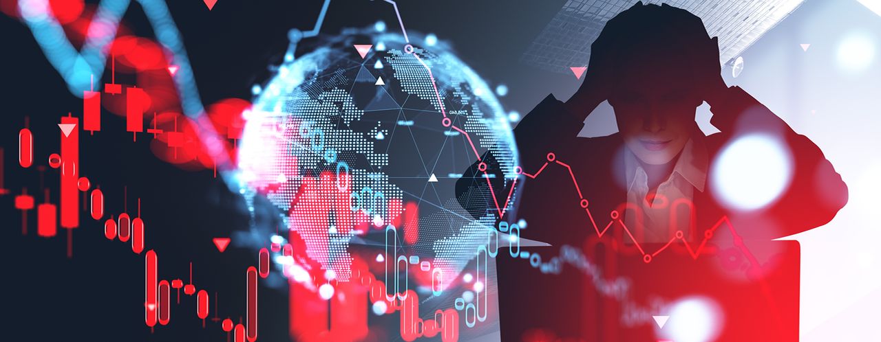 Digitalised Earths globe surrounded by candle graphs indication global markets